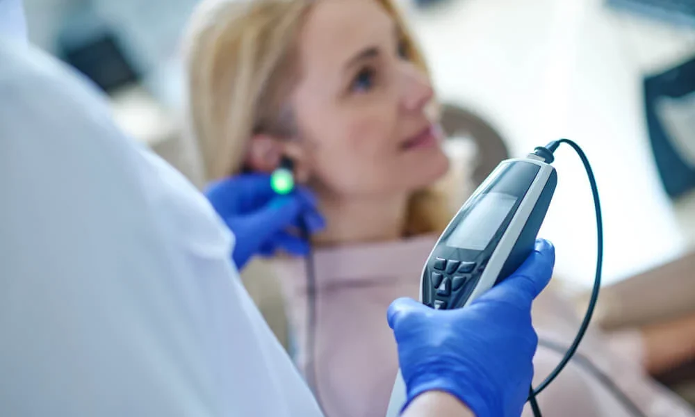 cropped-photo-medical-professional-disposable-sterile-gloves-performing-audiometry-test-blonde-woman-1-1