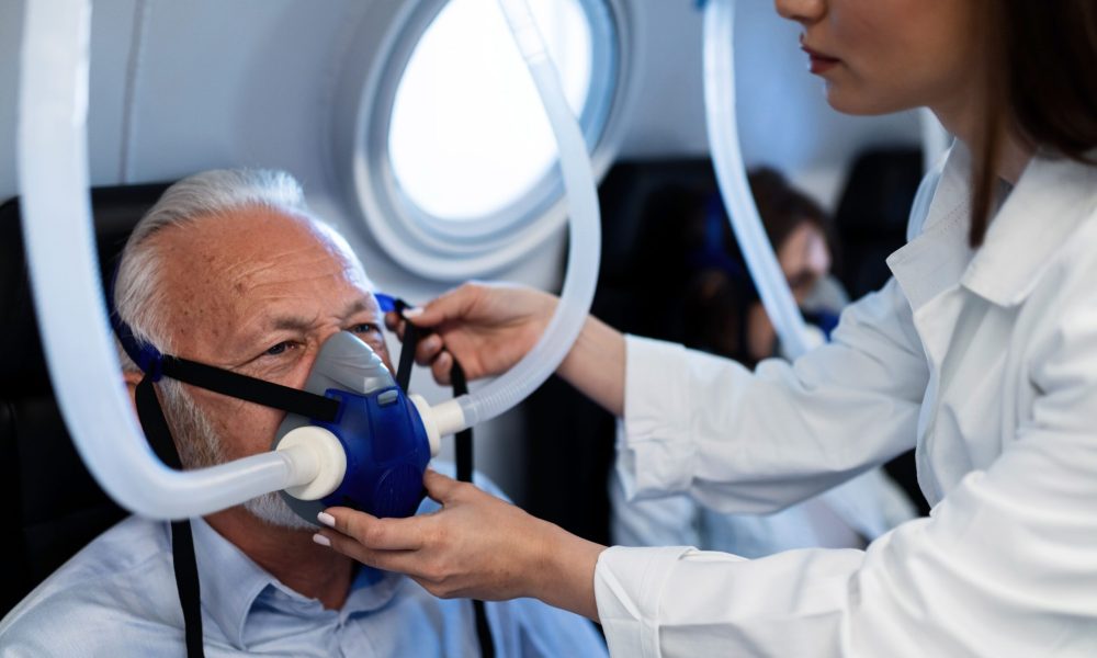 female-doctor-adjusting-oxygen-mask-senior-patient-hyperbaric-chamber-clinic-focus-is-n-senior-man