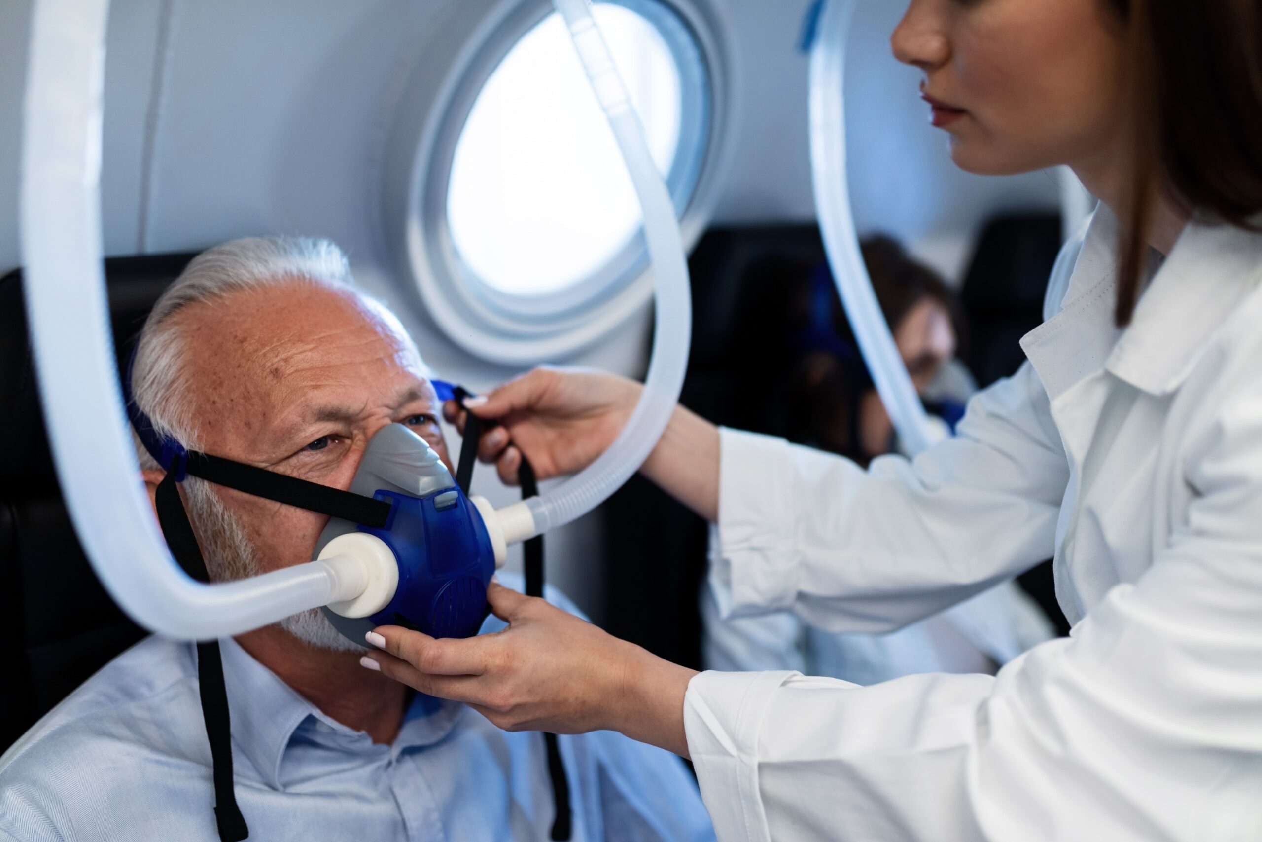 female-doctor-adjusting-oxygen-mask-senior-patient-hyperbaric-chamber-clinic-focus-is-n-senior-man